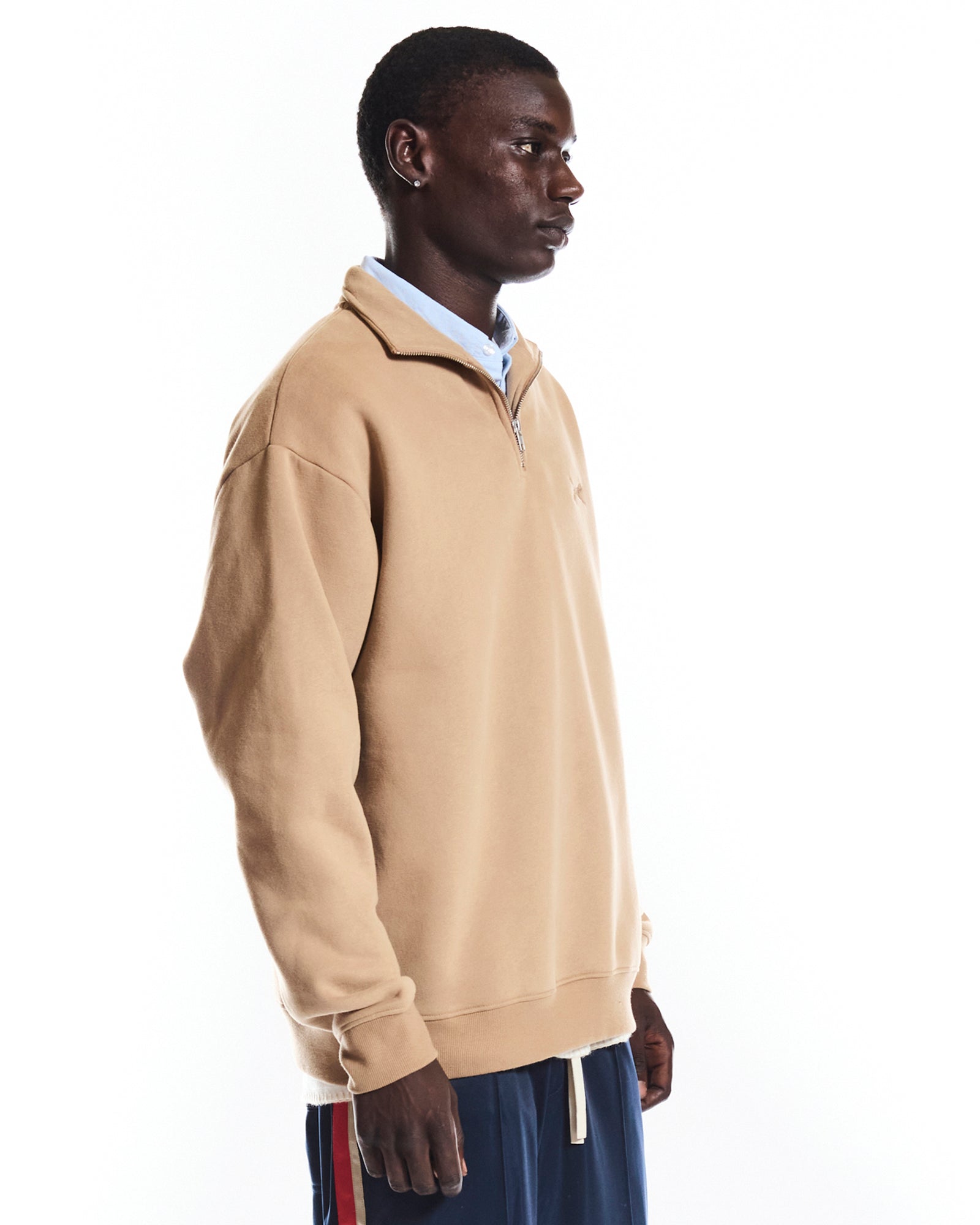 THE HERITAGE QUARTER ZIP SWEATER