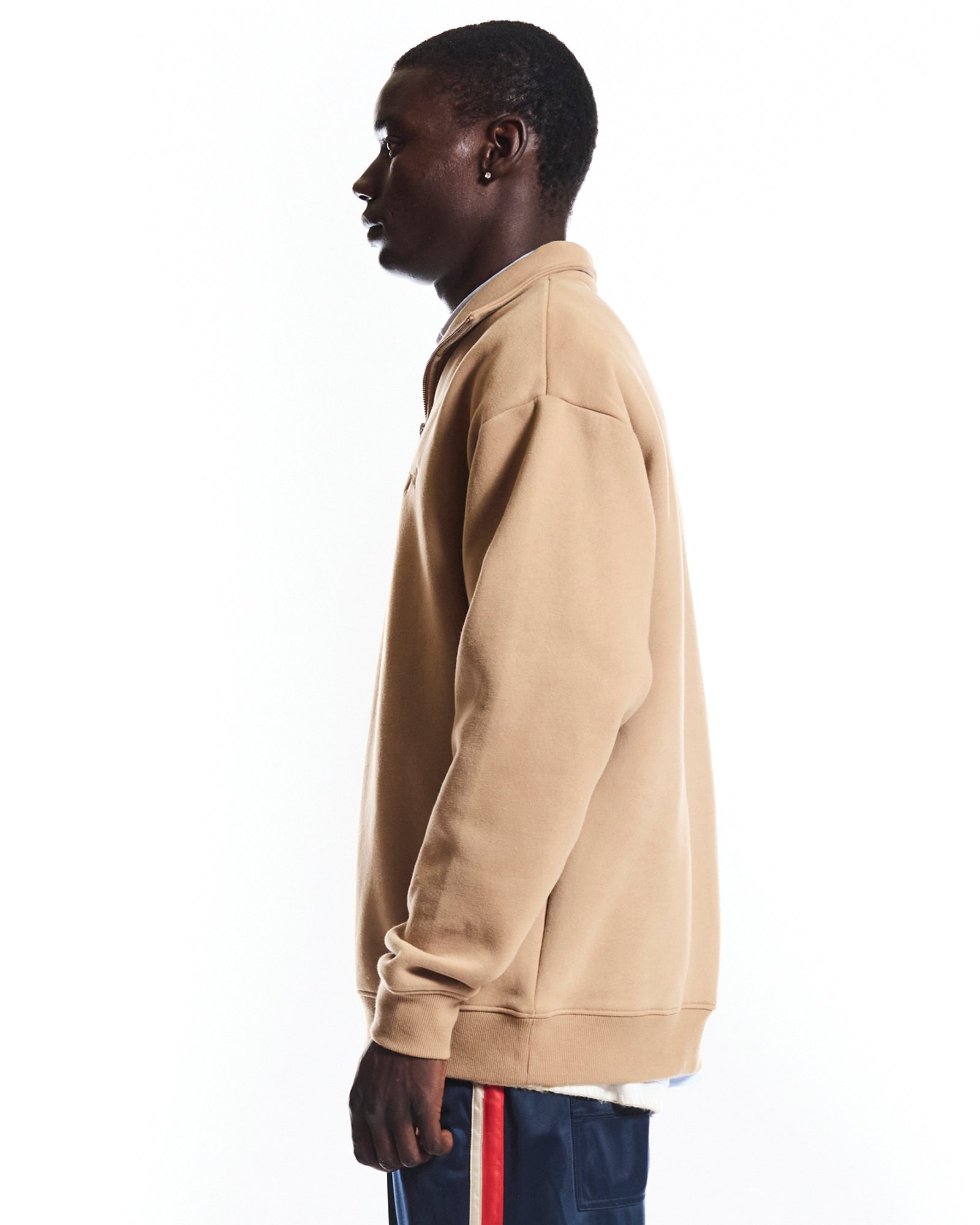 THE HERITAGE QUARTER ZIP SWEATER