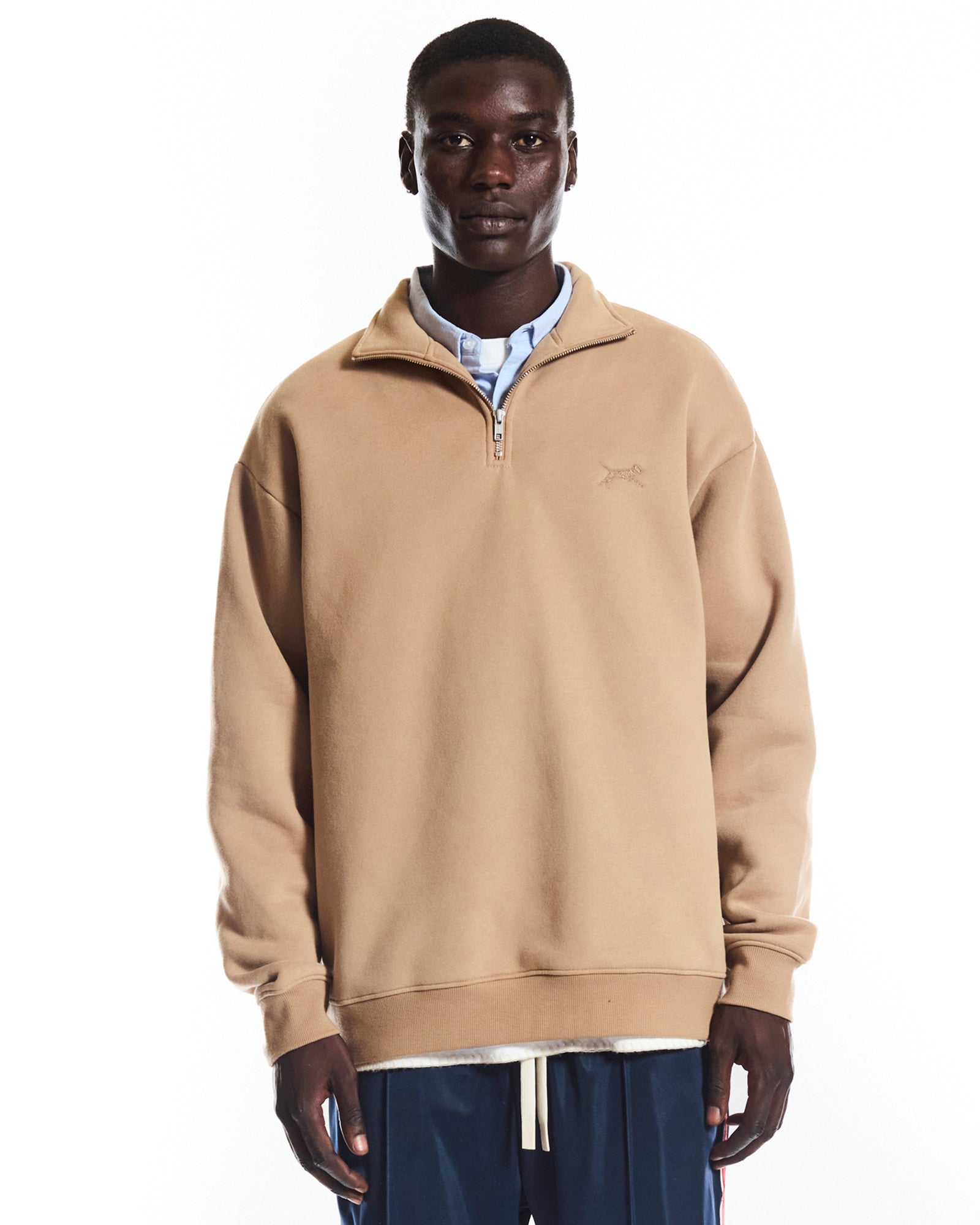 THE HERITAGE QUARTER ZIP SWEATER